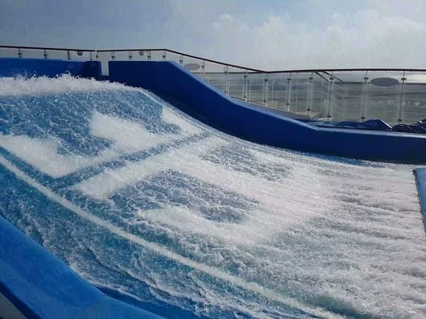 Surf simulator in Oasis of the Seas. Royal Caribbean cruise ship Stock Footage 72843261