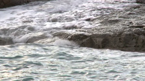 Surf on stone beach with foam 스톡 동영상 84316388