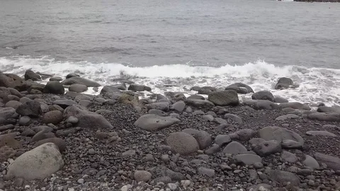 Surf on a stone beach Stock-Footage 106881372