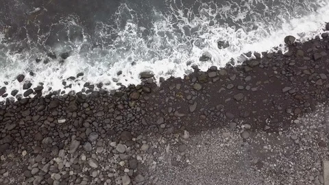 Surf on a stone beach Stock Footage 106881425