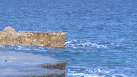 Surf on stone beach in summer 스톡 동영상 84316271