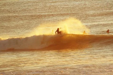 Surf at sunset Stock Photos