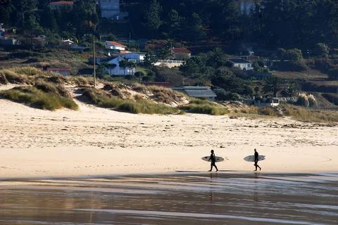Surf time on the beach Stock Photos