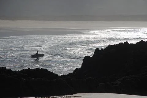 Surf time on the beach Stock Photos
