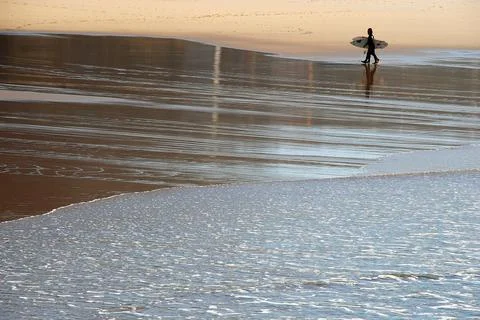 Surf time on the beach Stock Photos