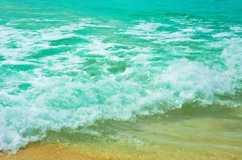 Surf in the tropical beach Stock Photos