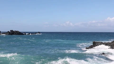 Surf waves rolling over a reef with white water break. Splash of the wave. 4K. Stock Footage 202343638