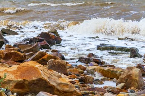 Surf waves stones Stock Photos