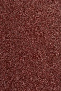 Surface of abrasive material, for processing rusty metal. Stock Photos