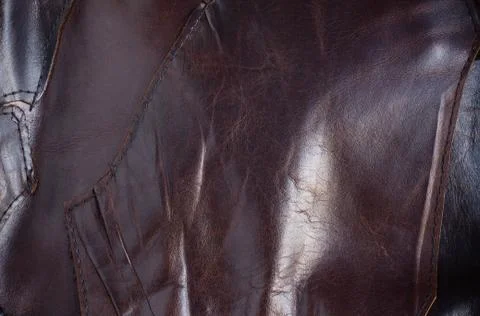 Surface and seam of leather. Stock Photos