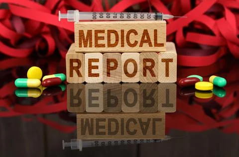 On the surface are visible tablets, a syringe, wooden dies and their reflecti Stock Photos