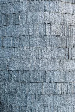 Surface, background of vertically folded tiles with stone surface Stock Photos