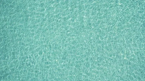 Surface of blue or turquoise swimming pool with clear water ripple waves for  Stock Footage 169831793