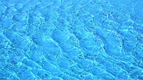 Surface of blue streaming water with ripples Stock Footage 137783696