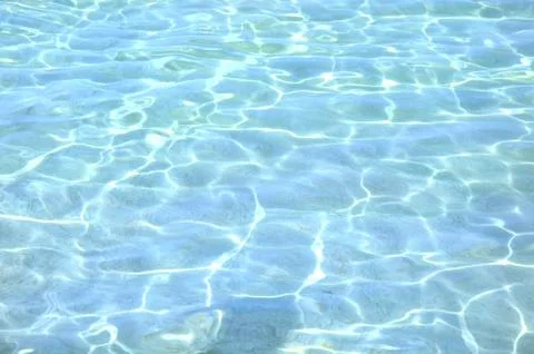 Surface of blue swimming pool, background of water in sea Stock Photos