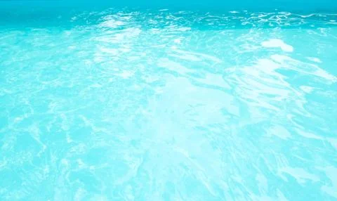 Surface of blue swimming pool. Background of water in swimming pool Stock Photos