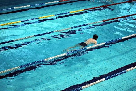 Surface of blue swimming pool. Stock Photos