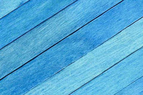 The surface of the boards painted in blue. Stock Photos
