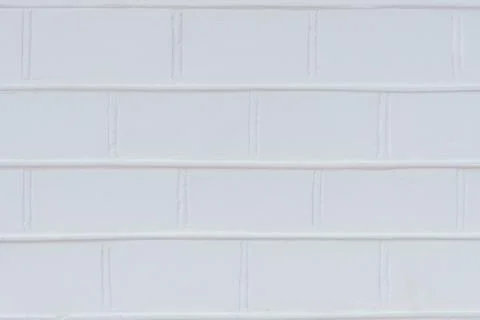 The surface of the brickwork is painted white Stock Photos