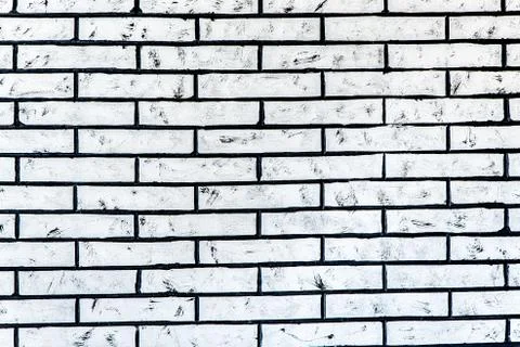 The surface of the brickwork is painted white Stock Photos