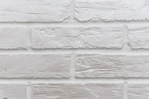 The surface of the brickwork is painted white Stock Photos