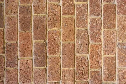 Surface of brown old brick wall background. Stock Photos