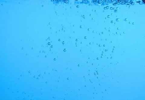 Surface Bubbles under Blue water back ground Copy space Stock Photos
