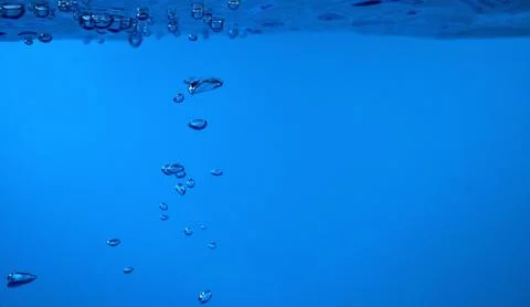 Surface Bubbles under Blue water back ground Copy space Stock Photos