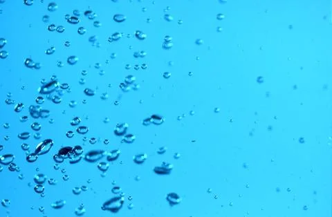 Surface Bubbles under Blue water back ground Copy space Stock Photos