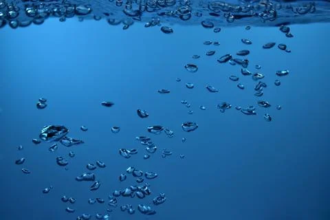 Surface Bubbles under Blue water back ground Copy space Stock Photos