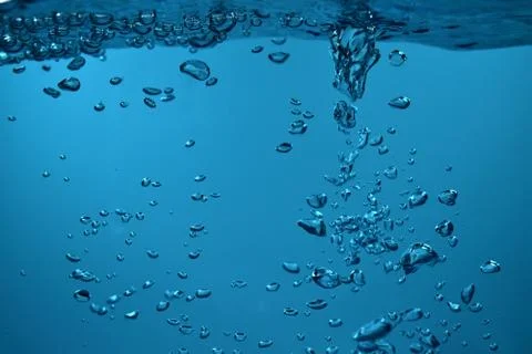 Surface Bubbles under Blue water back ground Copy space Stock Photos