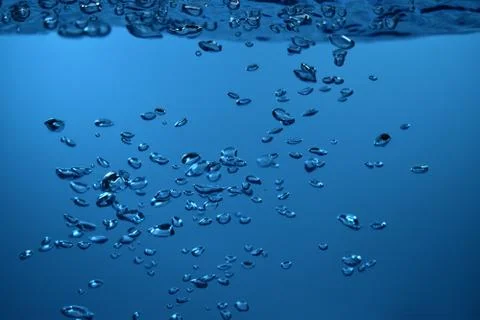 Surface Bubbles under Blue water back ground Copy space Stock Photos