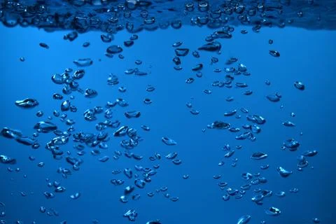 Surface Bubbles under Blue water back ground Copy space Stock Photos