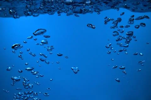 Surface Bubbles under Blue water back ground Copy space Stock Photos