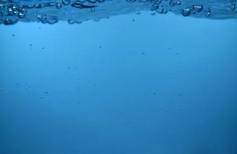 Surface Bubbles under Blue water back ground Copy space Stock Photos