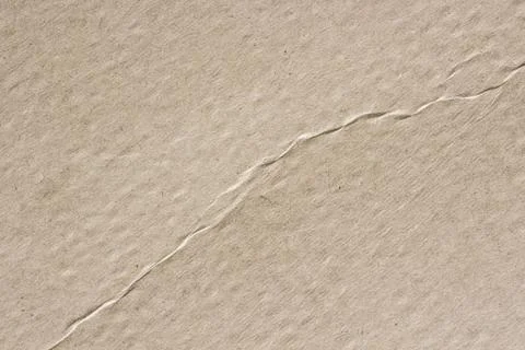 Surface of cardboard with a crease. background, texture Stock Photos