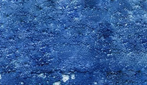 The surface of the cement wall damaged by time. Stock Photos