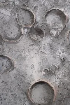Surface with circular patterns and textures made of concrete Stock Photos