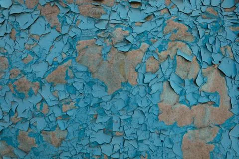 Surface with collapsing paint under the influence of moisture and sunlight Stock Photos