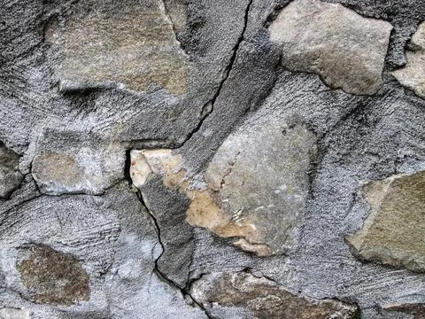 Surface with concrete and broken brick. Cracked floor on the road. Destruction 스톡 일러스트