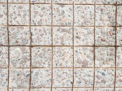 Surface of a concrete slab with a worn surface and a reinforcement mesh Stock Photos