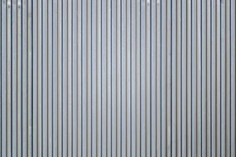 The surface of the corrugated sheet vertically oriented, narrow rows. Stock Photos