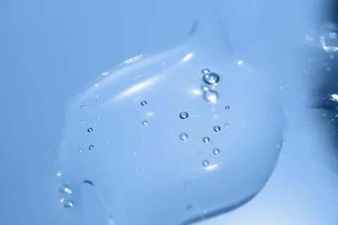 The surface of the cosmetic product has bubbles. blurred background. soft foc Stock Photos