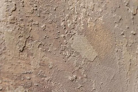 Surface covered with decorative plaster with a chaotic pattern, multi-colored Stock Photos