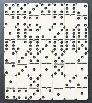 Surface covered with domino bones Stock Photos
