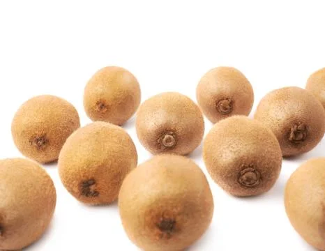 Surface covered with multiple kiwifruits Stock Photos