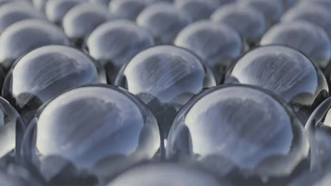 Surface covered with reflective glass mirror spheres. Looping video. Animated Video stock 246056142