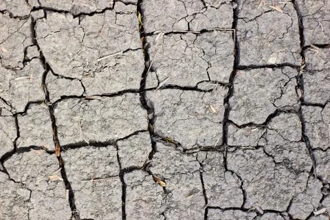 Surface of cracked earth for texture background, dried clay Stock Photos