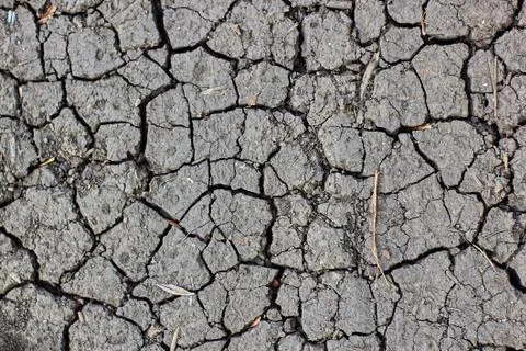 Surface of cracked earth for texture background, dried clay Stock Photos