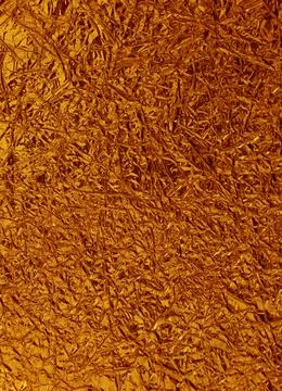 Surface of crumpled foil close-up. Stock Photos